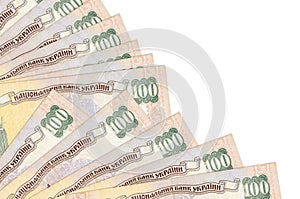 100 Ukrainian hryvnias bills lies isolated on white background with copy space stacked in fan close up