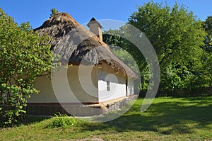 Ukrainian hut with a large straw roof