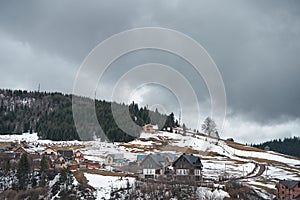 Ukrainian karpaty mountains winter landscape. Village among mountains