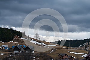 Ukrainian karpaty mountains winter landscape. Village among mountains