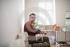 Ukrainian man in formalwear waiting for his turn for interview