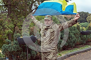 The Ukrainian military with flag of Ukraine