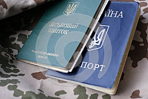 Ukrainian military ID and national passport on military uniform