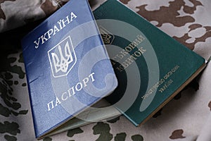 Ukrainian military ID and national passport on military uniform