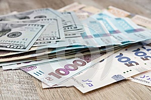 Ukrainian money - hryvnia banknotes USA dollars bills. Finance in Ukraine, of the hryvnia to the dollar exchange rate. Multi curre