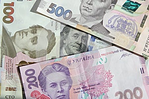 Ukrainian money - hryvnia banknotes USA dollars bills. Finance in Ukraine