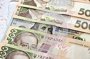 Ukrainian money - hryvnia banknotes USA dollars bills. Finance in Ukraine, of the hryvnia to the dollar exchange rate. Multi curre