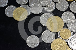 Ukrainian money, metal change, white and yellow coins of 10, 25, 50 kopecks, 1, 2, 5, 10 hryvnias