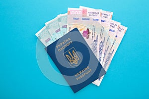 Ukrainian passport and money. Biometric passport of a citizen of Ukraine and 200, 1000 banknote