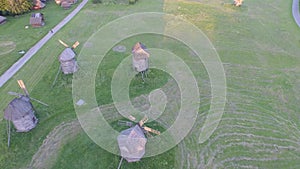 Ukrainian Pirogovo village with ancient authentic houses. 4k. Aerial view.