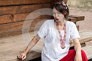 Ukrainian pregnant woman in traditional embroidered shirt