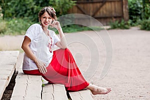 Ukrainian pregnant woman in traditional embroidered shirt