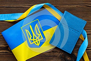 Ukrainian refugees migration concept. Ukaraine flag and passpotrs