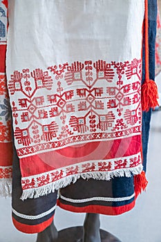 Ukrainian traditional old red white embroidery, towel, apron, pinafore. Close-up photo