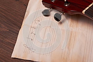 Ukulele and musical paper notes
