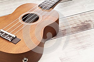 Ukulele on the rustic wooden table