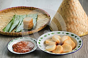 Ulen Ketan, Indonesian Traditional Snack Made from Steam Sticky Rice, Compressed or Shaped and then Deep Fried, Served with Sambal