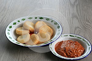 Ulen Ketan, Indonesian Traditional Snack Made from Steam Sticky Rice, Compressed or Shaped and then Deep Fried, Served with Sambal