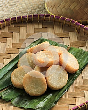 Ulen Ketan, Indonesian Traditional Snack Made from Steam Sticky Rice, Compressed or Shaped and then Deep Fried, Served with Sambal