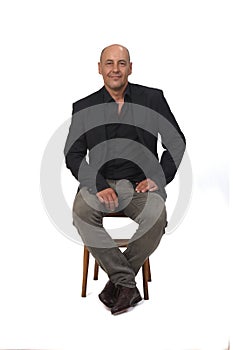 Ull portrait of a man sitting  on chair
