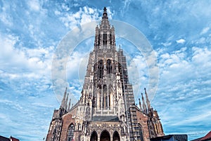 Ulm Minster or Cathedral of Ulm city, Germany. It is top landmark of Ulm. Front view of famous medieval Christian church of Ulm