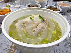 Ulsan, South Korea - Samgyetang delivered in a plastic bowl.