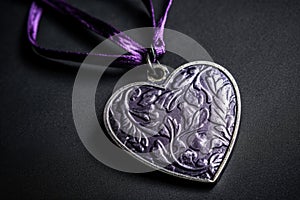 The Ultimate Honor: A Close-Up of the Purple Heart Medal in High Contrast