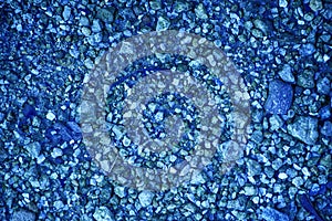 Ultra blue Pebble surface, stone texture or rock backdrop, ground background