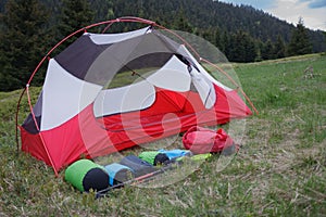 Ultra-sil dry sacks, trekking sticks, open inner tent body without rainfly, in the morning in mountain pass in Mala Fatra