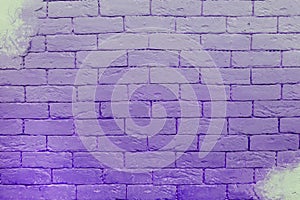 Ultra violet background of vintage brick wall