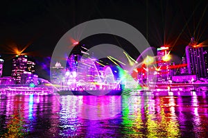 Ultra violet lights show lighting up Brisbane city at night time