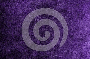 Ultra violet or purple suede texture backdrop. Leather skin natural pattern or abstract background