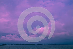 Ultra-violet seascape with clouds