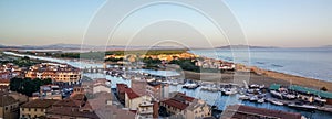 Ultra wide angle view of Castiglione della Pescaia al tramonto