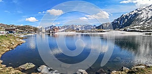 Ultra wide panorama of the lake in the Gotthardpass