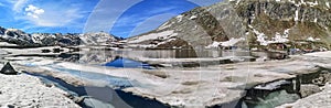 Ultra wide panorama of the lake in the Gotthardpass