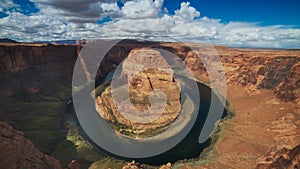Ultra wide shot of horseshoe bend with blue sky