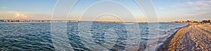 Ultra wide view of the beach of Fano at sunset photo