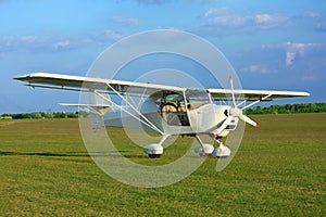 Ultralight aircraft on grass