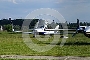 Ultralight airplane on the airfield.