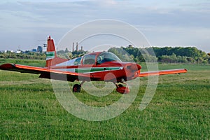 Ultralight airplane on the airfield.