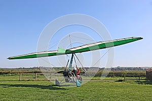 Ultralight airplane on a grass airfield
