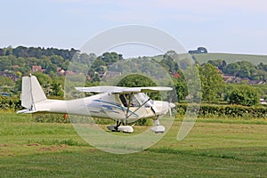 Ultralight airplane on a grass strip