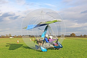 Ultralight airplane in a landing field