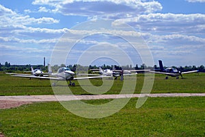 Ultralight airplanes on the airfield.