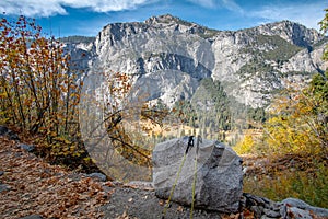 Ultralight Hiking Poles and Scenic landscape of Yosemite Granite Cliff