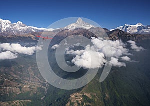 Ultralight plane flies over Pokhara and Annapurna region