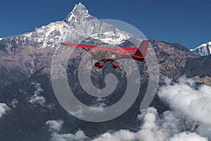 Ultralight plane flies over Pokhara and Annapurna region