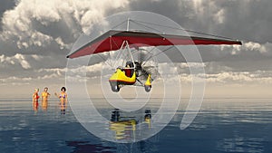 Ultralight trike over the sea and bathing women