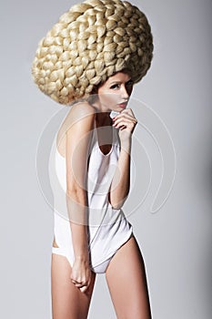 Ultramodern Hairstyle. Trendy Woman with Creative Art Wig with Braids